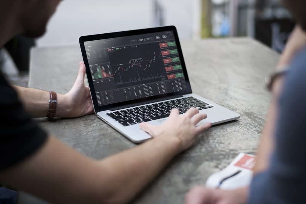 cryptocurrency invesing on laptop